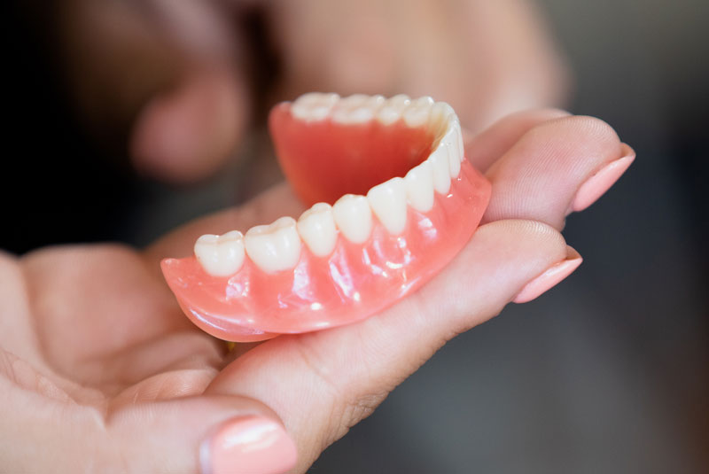 denture model on counter top